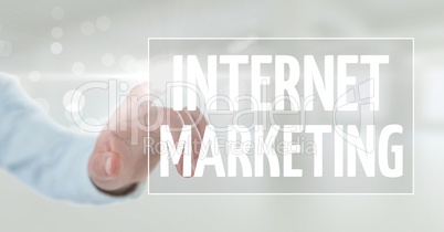 Hand interacting with internet marketing business text against white background