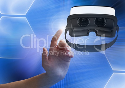 Hand touching and interacting with virtual reality headset with transition effect
