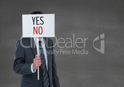 Business man holding a card with yes/no text