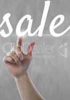 Hand interacting with sale business text against grey background