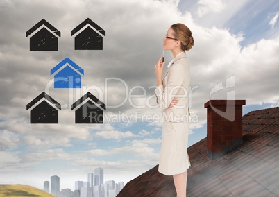 Home icons and Businesswoman standing on Roof with chimney and city in distance