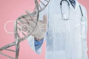 Doctor interacting with 3D DNA strand against pink background