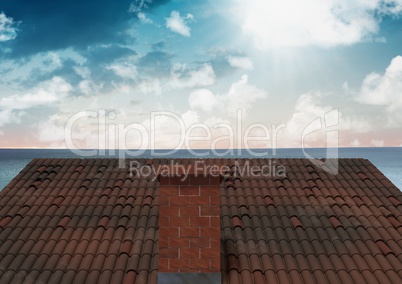 Roof with chimney and ocean sky