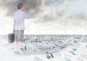Businesswoman in sea of documents under sky clouds with briefcase
