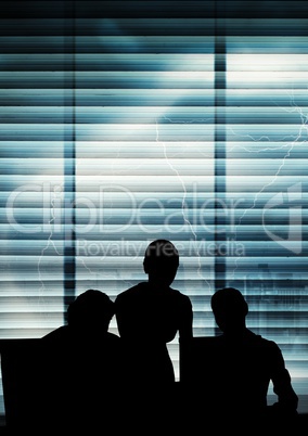 Business people silhouettes against building