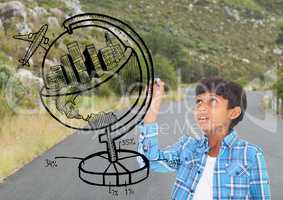 Boy drawing a globe on the road