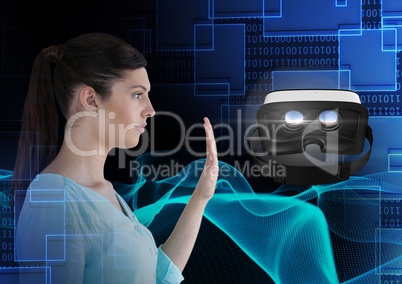 Woman holding hand out and interacting with virtual reality headset with transition effect