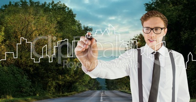 Man drawing a city on the road