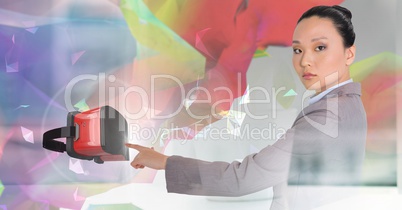 Woman touching and interacting with virtual reality headset with transition effect