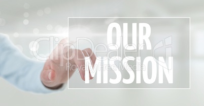 Hand interacting with our mission business text against white background
