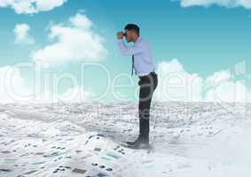 Businessman holding binoculars in sea of documents under sky clouds