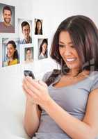 Woman holding phone with Profile portraits of people contacts