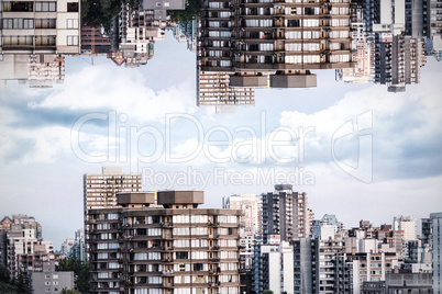 Trees by buildings in city