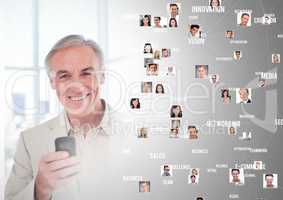 Man holding phone with Profile portraits of people contacts