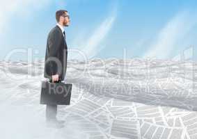 Businessman holding briefcase in sea of documents under sky clouds