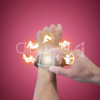 Composite image of cropped image of man using watch