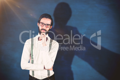 Composite image of portrait of smiling man with hand on chin