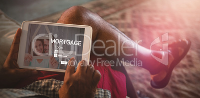 Composite image of graphic image of mortgage login page and couple holding model house