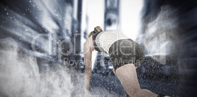 Composite image of female athlete in position ready to run