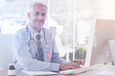 Composite image of breast cancer awareness ribbon