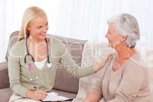 Composite image of doctor talking with her patient