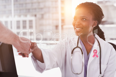 Composite image of breast cancer awareness ribbon