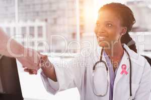 Composite image of breast cancer awareness ribbon