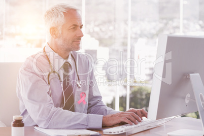 Composite image of breast cancer awareness ribbon