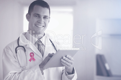 Composite image of breast cancer awareness ribbon