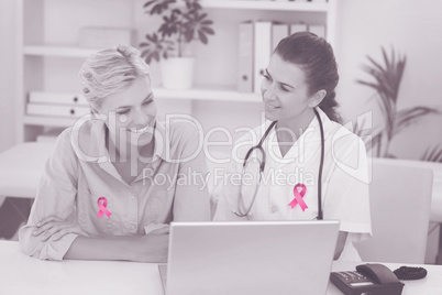 Composite image of breast cancer awareness ribbon