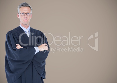 Male judge arms folded against brown background