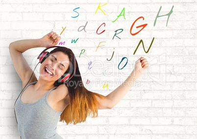 young woman listening music with colour letters around.
