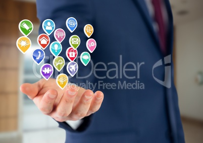 businessman with hand spread of  with application icons over. office blurred background