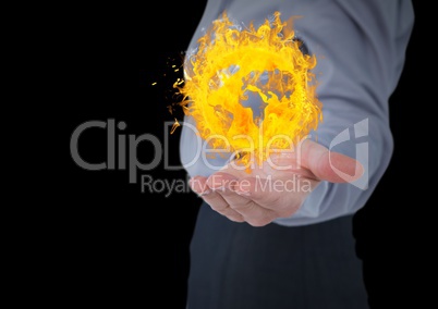 businesswoman hand spread of with earth fire icon over. Black background