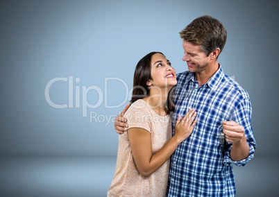Couple Holding key in front of vignette