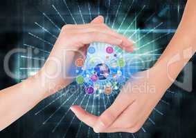 hands with application icons and earrh with lights and flares. technology background