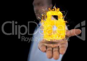 man with hand spread of with lock fire icon over. Black background