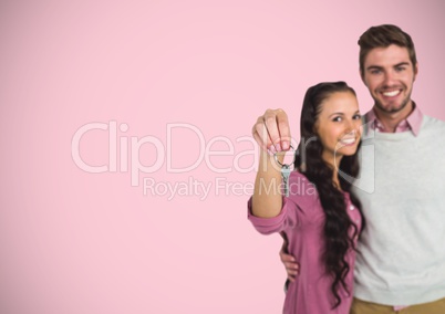 Couple Holding key in front of vignette