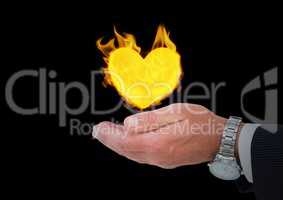 hand with heart  fire icon over. Black background