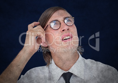 Close up of nerd man with grunge overlay scratching head against blue background