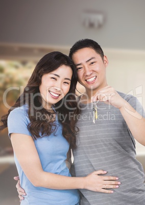 Couple Holding key  in home