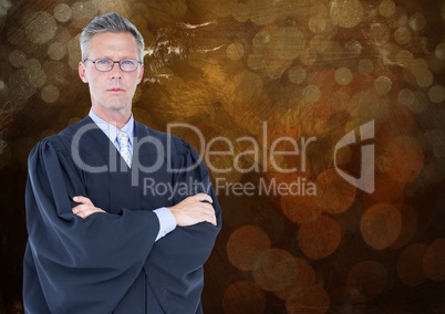 Male judge arms folded against brown bokeh