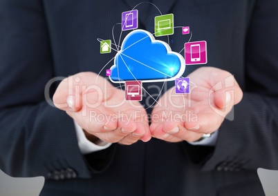 businessmans hands with cloud with application icons over.