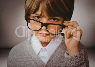 Close up of nerd boy in pink room