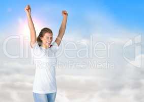 Woman cheering against sunny sky