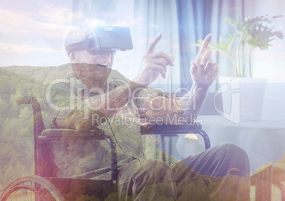 senior man on wheelchair with VR glasses in the mountains