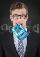 Nerd man with calculator in mouth against grey grunge wall