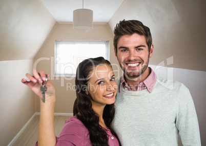 Couple Holding key in new home