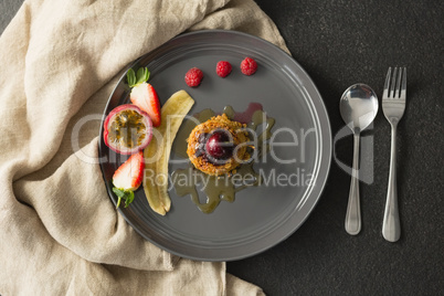 Healthy breakfast with fruits in a plate