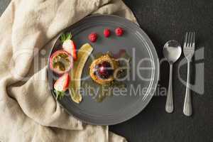 Healthy breakfast with fruits in a plate